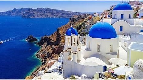 Santorini, Greece: For its active volcanoes and stunning sunset views